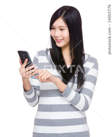 Woman read the message on cellphone Woman read the message on cellphone 14003776