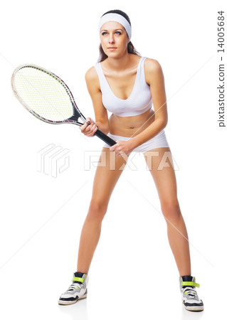 Woman playing tennis and waiting for the service 14005684