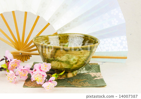 Matcha tea bowl, folding fan and cherry blossoms 14007387