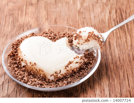 vanilla jelly and chocolate with a spoon 14007724