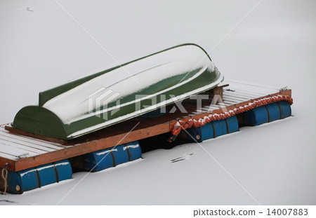 Winter covered with snow rowing boat Winter covered with snow rowing boat 14007883