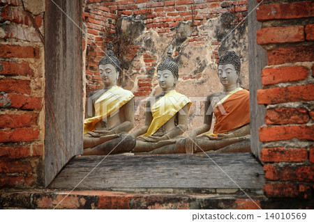 ancient buddha statues through window ancient buddha statues through window 14010569