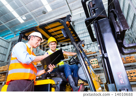 Asian lift truck driver and foreman in storage Asian lift truck driver and foreman in storage 14010688