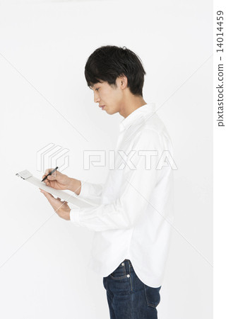 A young man with a white shirt to write something A young man with a white shirt to write something 14014459