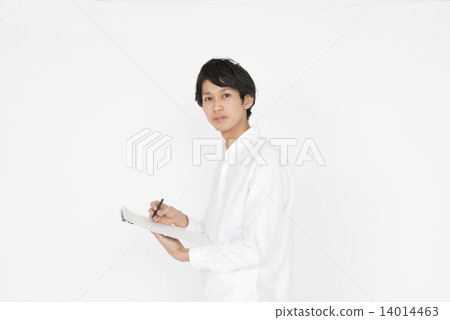 A young man with a white shirt to write something A young man with a white shirt to write something 14014463