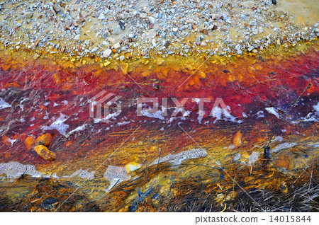 Contaminated red, toxic water stream in Geamana, Romania Contaminated red, toxic water stream in Geamana, Romania 14015844