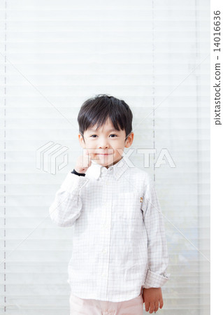 A boy in a shirt A boy in a shirt 14016636
