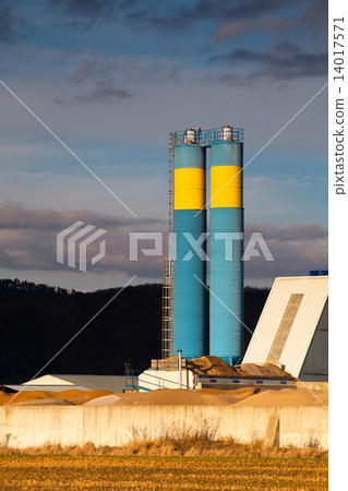 Blue concrete silos at sunset Blue concrete silos at sunset 14017571