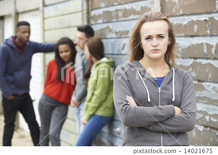 Gang Of Teenagers Hanging Out In Urban Environment 14021675