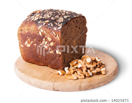 Unleavened bread with seeds on wooden board with nuts 14025871