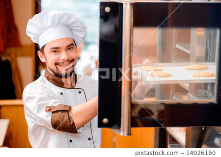 Handsome cook in the kitchen Handsome cook in the kitchen 14026160