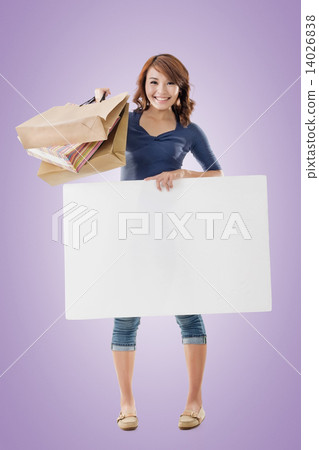 Shopping woman holding bags and blank board 14026838