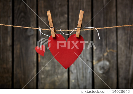 Two Paper Hearts Hang on Clothesline 14028643