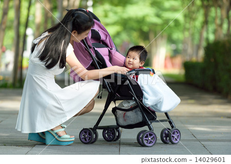 Chinese mother with baby in a stroller 14029601