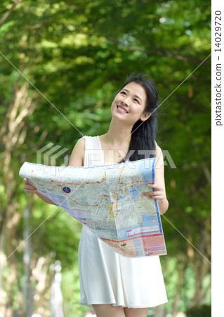 One chinese woman sightseeing along promenade 14029720
