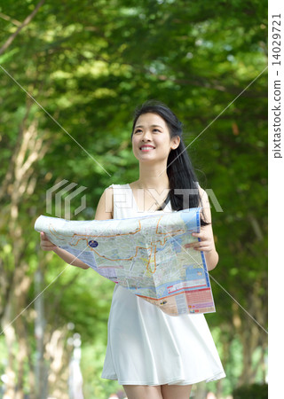 One chinese woman sightseeing along promenade One chinese woman sightseeing along promenade 14029721