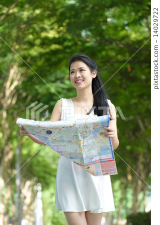 One chinese woman sightseeing along promenade 14029722