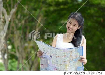 One chinese woman sightseeing along promenade 14029751