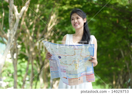 One chinese woman sightseeing along promenade 14029753