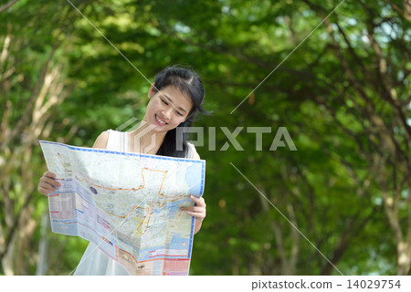 One chinese woman sightseeing along promenade 14029754