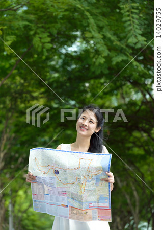 One chinese woman sightseeing along promenade One chinese woman sightseeing along promenade 14029755