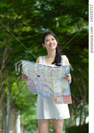 One chinese woman sightseeing along promenade 14029757