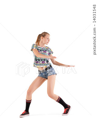 Beautiful booty dancer posing on studio background Beautiful booty dancer posing on studio background 14031548