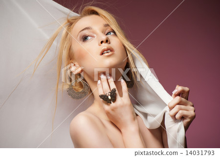 Beautiful Young Woman in Chiffon Scarf covering her head 14031793