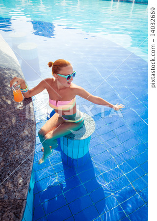 Girl in pool bar Girl in pool bar 14032669