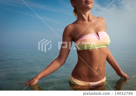 Beautiful woman in the sea 14032789