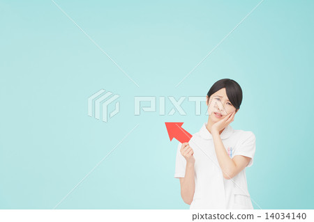 A troubled nurse pointing with an arrow 14034140