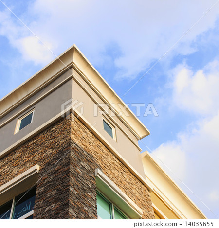Close up detail of building on blue sky. Close up detail of building on blue sky. 14035655