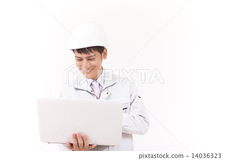 Worker watching laptop computer 14036323