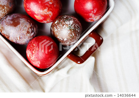Easter eggs on textile draped background 14036644