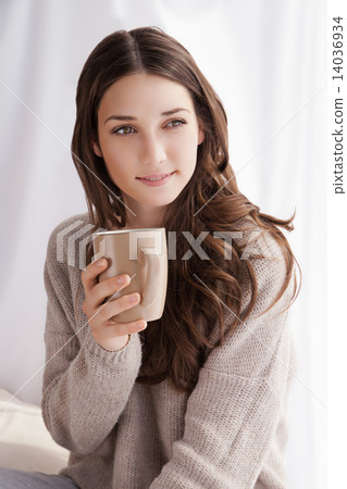 beautiful woman drinking coffee, sitting by window beautiful woman drinking coffee, sitting by window 14036934