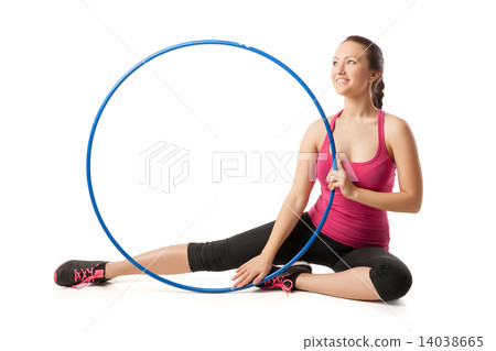 isolated portrait of young blonde woman gymnast with hula hoop 14038665