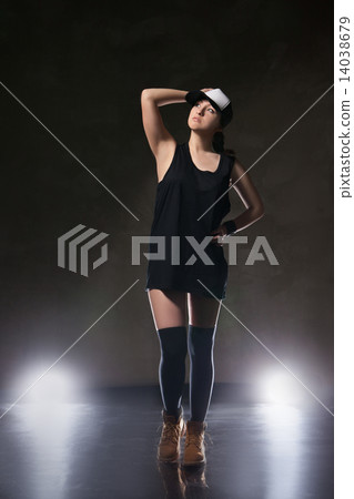Sexy young woman in a trendy clothes over black background 14038679