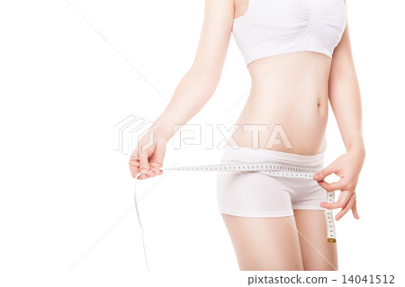 Slimming woman measuring hip with tape 14041512