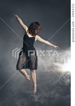 Modern style dancer posing on grey background 14043151