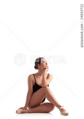 young beautiful dancer posing on studio background young beautiful dancer posing on studio background 14043712