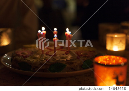 Birthday cake with candles and colorful bokeh 14048638