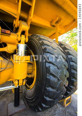 Heavy mining truck in mine and driving along the opencast. Photo of the big mine truck, The career h Heavy mining truck in mine and driving along the opencast. Photo of the big mine truck, The career h 14048843