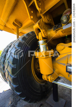 Heavy mining truck in mine and driving along the opencast. Photo of the big mine truck, The career h Heavy mining truck in mine and driving along the opencast. Photo of the big mine truck, The career h 14048844
