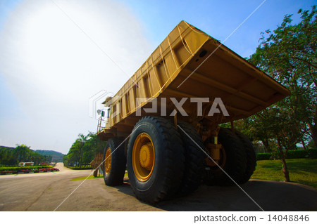 Heavy mining truck in mine and driving along the opencast. Photo of the big mine truck, The career h Heavy mining truck in mine and driving along the opencast. Photo of the big mine truck, The career h 14048846