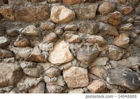 vintage stone wall surface with cement. Closeup old stone wall. 14048988