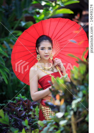 Thai Woman In Traditional Costume Thai Woman In Traditional Costume 14049174