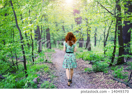 Beautiful woman in the park 14049370