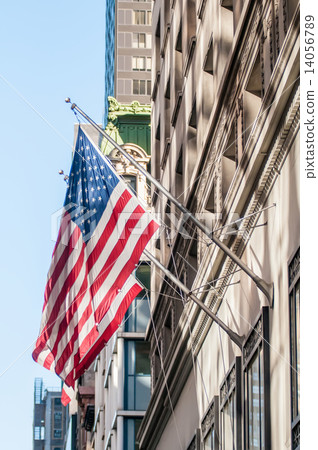 american flag on a historic building 14056789