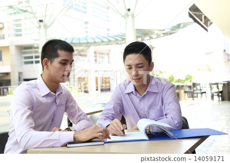 Two Man  business executive  cafe table meeting file 14059171