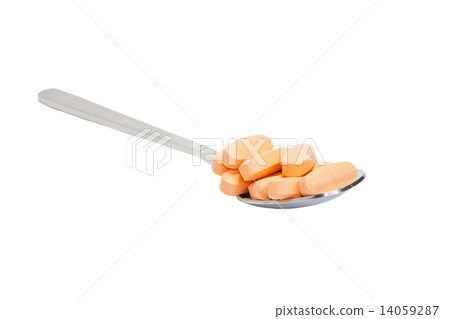 Spoon filled with pills 14059287